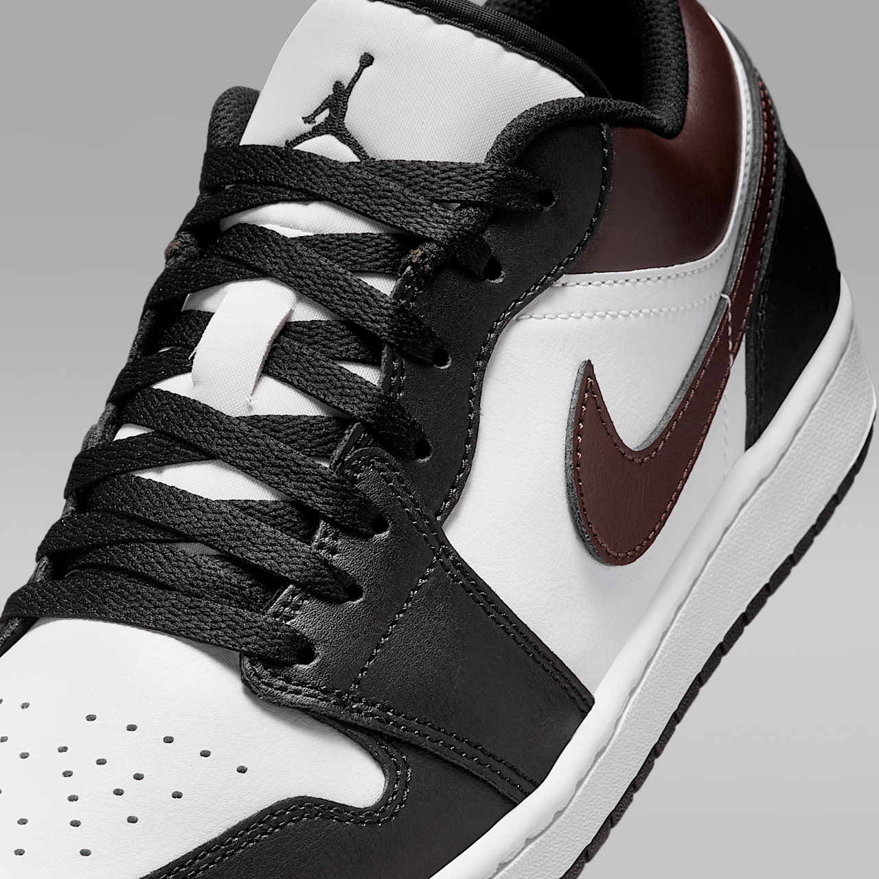 Nike Air Jordan 1 Low sneaker Zwart/Wit/Game Royal/Baroque Brown