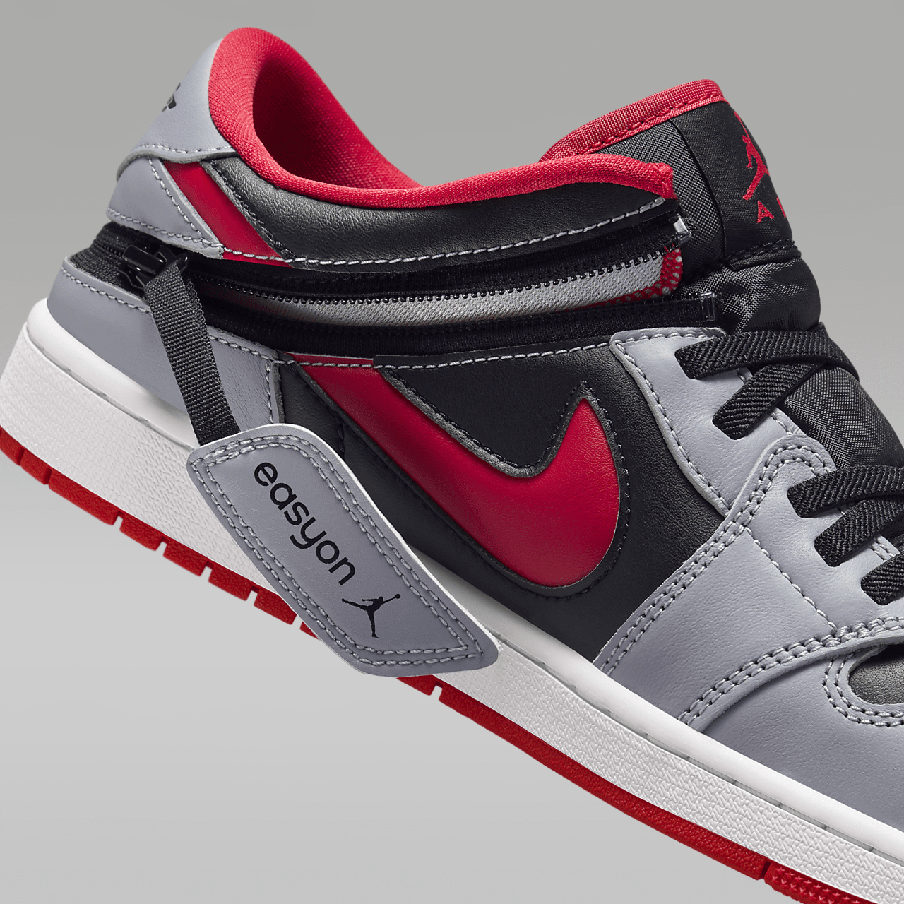 Nike Air Jordan 1 Low sneaker Zwart/Cement Grey/Wit/Fire Red