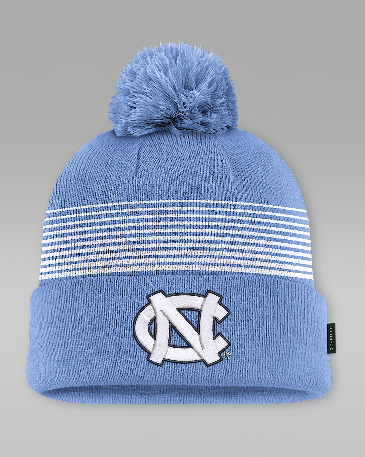 Женские  North Carolina Sideline Peak Jordan Brand College Cuffed Pom Beanie