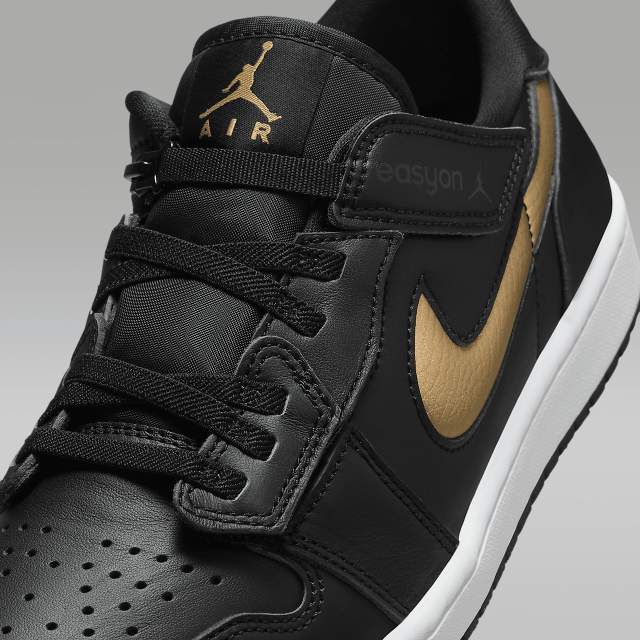 Nike Air Jordan 1 Low sneaker Zwart/Wit/Metallic Gold