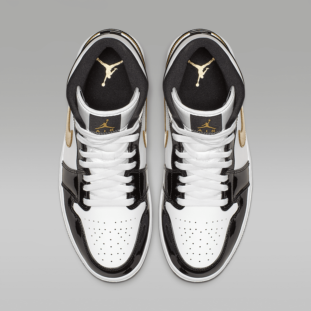 Nike Air Jordan 1 Mid sneaker Zwart/Wit/Metallic Gold