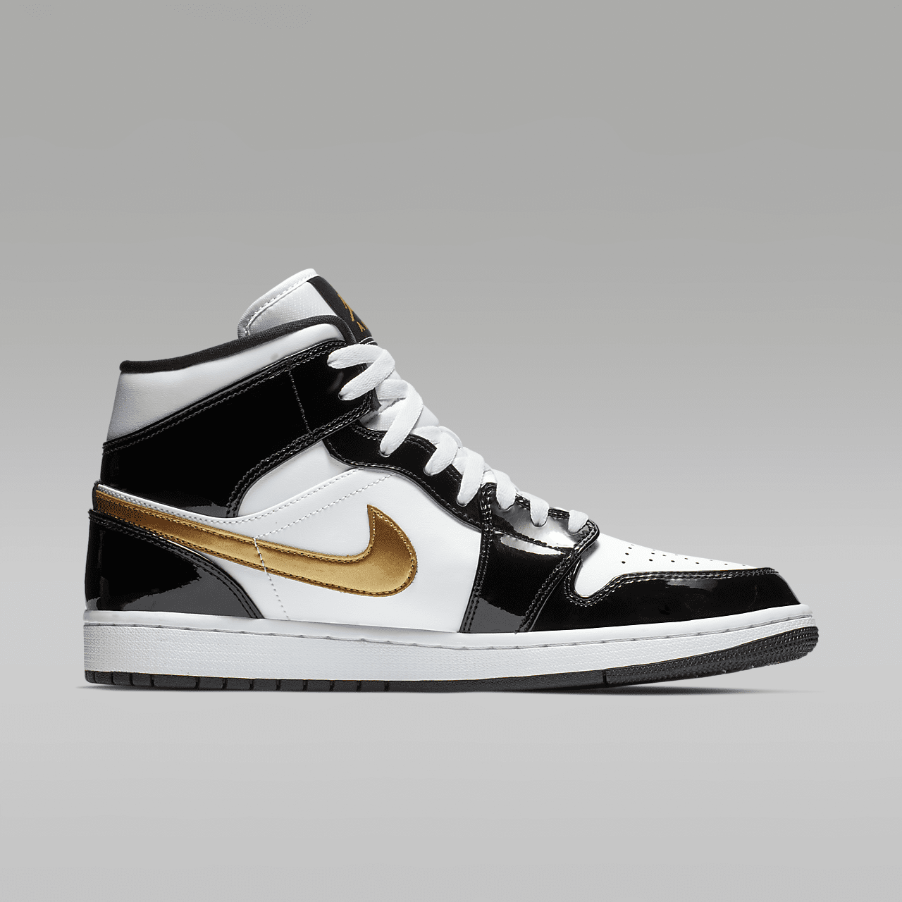 Nike Air Jordan 1 Mid sneaker Zwart/Wit/Metallic Gold