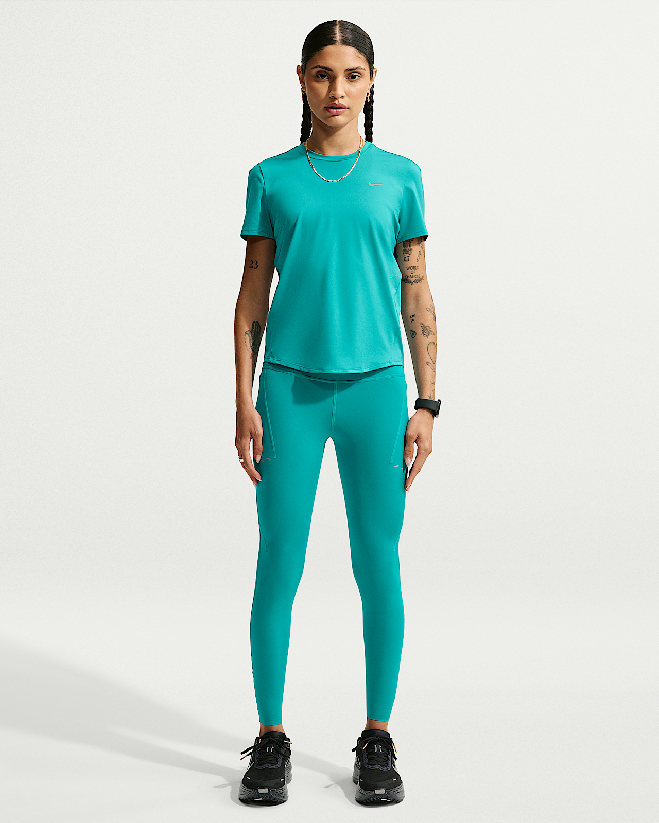 Женские тайтсы Nike Swift High-Waisted 7/8 Leggings with Pockets для бега