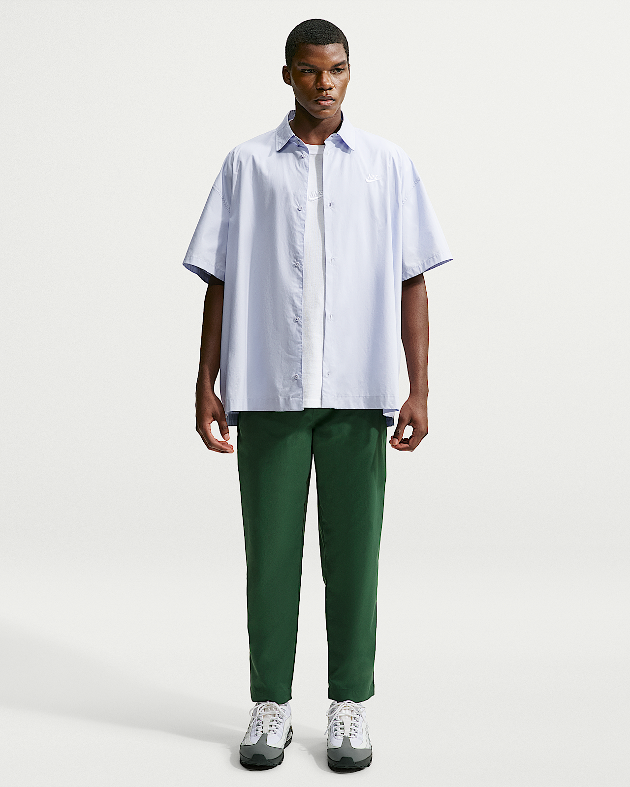 Мужские  Nike Club Woven Tapered Pants