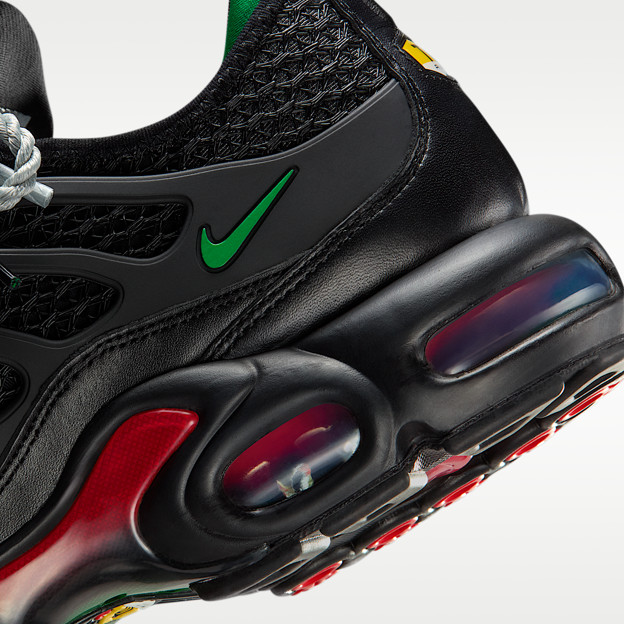 Nike Air Max Plus sneaker Zwart/University Red/Court Green