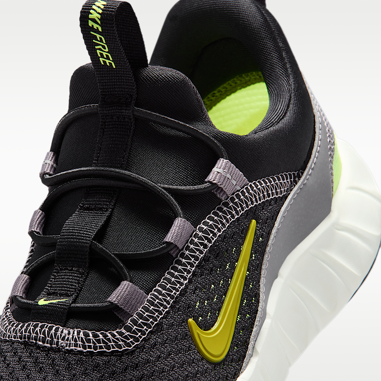 Nike Free sneaker Zwart/Pencil Point/Volt Ice/Saffron Quartz