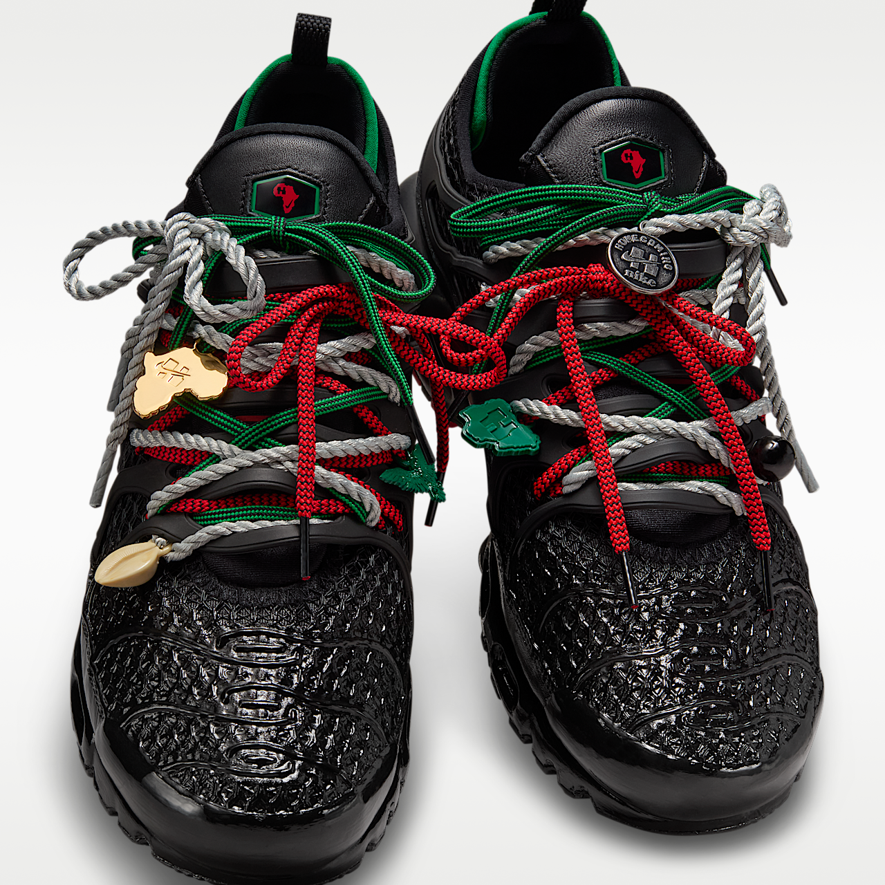 Nike Air Max Plus sneaker Zwart/University Red/Court Green