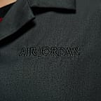 Air Jordan Women's Long-Sleeve Woven Top