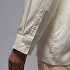 Air Jordan Women's Long-Sleeve Woven Top