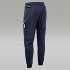 Pants universitarios marca Jordan Dri-FIT de pierna entallada para hombre Michigan Sideline Standard Issue