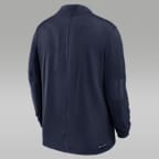 Playera universitaria marca Jordan Dri-FIT de medio cierre para hombre Michigan Sideline