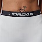 Jordan Sport Single-Leg-Basketball-Leggings mit hohem Bund für Damen (links)