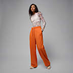 Γυναικείο παντελόνι από French Terry ύφασμα με ανοιχτό τελείωμα Jordan Flight Fleece