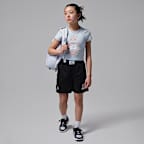 Playera de tela de punto floral para niños talla grande Jordan