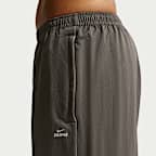 NikeSKIMS Crunchy Nylon damesbroek met wijde pijpen