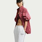 Nike Studio Fleece Medium Weight Pantalones de tiro medio con dobladillo abierto - Mujer
