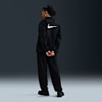 Pants de entrenamiento oversized de tiro medio para mujer Nike Sportswear Club Fleece