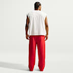 Pants de básquetbol Therma-FIT cepillados con dobladillo abierto para hombre Nike Standard Issue