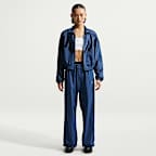 Pants estilo paracaídas de tiro alto holgados para mujer Nike Sportswear