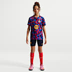 FC Barcelona Older Kids' Nike Dri-FIT Football Pre-Match Top