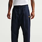 Pants plisados para hombre Nike Club Rules