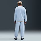 Pants de tejido Fleece con puños para hombre Nike Solo Swoosh