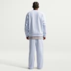 Calças de lã cardada de bainha aberta Nike Solo Swoosh para homem