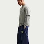 Nike Solo Swoosh Pantalón de tejido Fleece con dobladillo abierto - Hombre