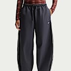 Tønneformet Nike Sportswear-bukse med mellomhøyt liv og ledig passform til dame