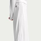 Pants de tejido Knit de poliéster de tiro medio y pierna ancha holgados para mujer Nike Sportswear