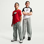 Pants holgados con dobladillo abierto para niños Nike Sportswear