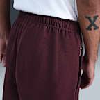 Pants de tejido Fleece con puños para hombre Nike Solo Swoosh