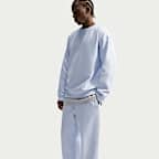 Calças de lã cardada de bainha aberta Nike Solo Swoosh para homem