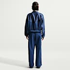 Pants estilo paracaídas de tiro alto holgados para mujer Nike Sportswear