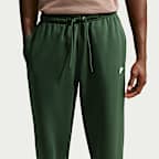 Pants de tejido Fleece con dobladillo abierto para hombre Nike Club