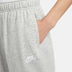 Pants de entrenamiento oversized de tiro medio para mujer Nike Sportswear Club Fleece