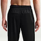 Pants Dri-FIT versátiles con dobladillo abierto para hombre Nike Totality