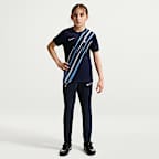 Tottenham Hotspur Older Kids' Nike Dri-FIT Football Pre-Match Short-Sleeve Top