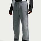 Pants de tejido Fleece con detalles de diseño reflejante con dobladillo abierto para hombre Nike Tech