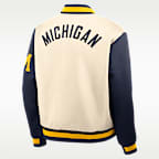 Chamarra bomber universitaria Nike de cierre a presión de largo completo para hombre Michigan Legacy