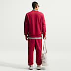 Pants de tejido Fleece cepillado con puños para hombre Nike Club