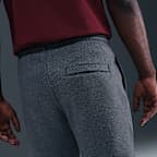 Pants de tejido Fleece con dobladillo abierto para hombre Nike Club