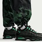 Pants cargo de tejido Woven con estampado integral para hombre Nike Air