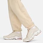 Pants de entrenamiento oversized de tiro medio para mujer Nike Sportswear Club Fleece