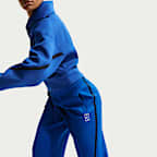 Pantaloni da tennis a vita media Dri-FIT Nike Advantage – Donna