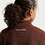 Nike Pro Therma-FIT fleeceoverdel med glidelås til store barn (jente)