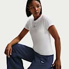 Pants de tiro medio con dobladillo abierto para mujer Nike Sportswear Everything Wovens