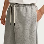 Basketshorts i fleecefrotté Nike Standard Issue Dri-FIT 20 cm för män