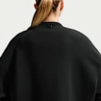 Playera Dri-FIT de cuello redondo oversized de cierre completo para mujer Nike 24.7 ImpossiblySoft