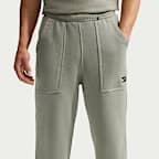 Męskie dzianinowe spodnie z nogawkami bez ściągaczy Nike Sportswear